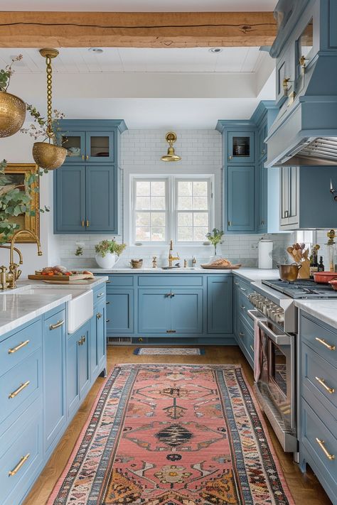 Vintage Blue Kitchen Charm | Powder blue shaker cabinets with brass hardware • Classic subway tile backsplash • Rustic exposed wooden beams • Elegant gold pendant lighting • White farmhouse sink with vintage-style faucet • Ornate patterned runner rug in warm tones • Butcher block countertops enhancing the quaint cottage feel. Rustic Kitchen Blue, Blue Aesthetic Home Decor, Blue Cabinets With Butcher Block, Blue Aesthetic Home, Vintage Blue Kitchen, White Blue Kitchen, Blue Shaker Cabinets, Two Toned Kitchen Cabinets, Kitschy Kitchen Decor