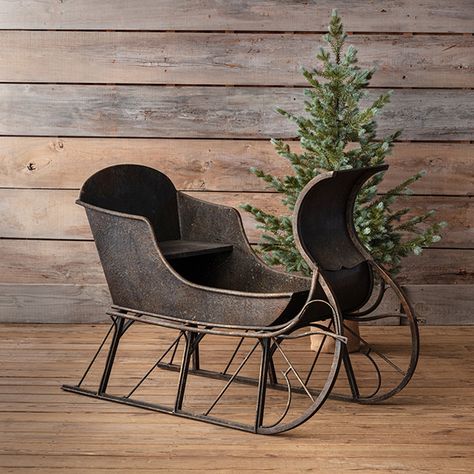 <p>Show off some of your favorite seasonal potted plants or use our <strong>Antiqued Decorative Metal Sleigh</strong> to hold decoratively wrapped gifts to create a charming holiday focal point. With a rustic black finish and a beautiful design, this large sleigh will easily become one of your favorite holiday pieces. Wherever you use this decorative sleigh, it will be a stylish and functional seasonal find.</p> Small Sleigh Decorating Ideas, Sleigh Decor, Christmas Sleigh Decorations, Winter Sleds, Cottage Chairs, Holiday Decorating Ideas, Cabin Gifts, Distressed Table, Holly House