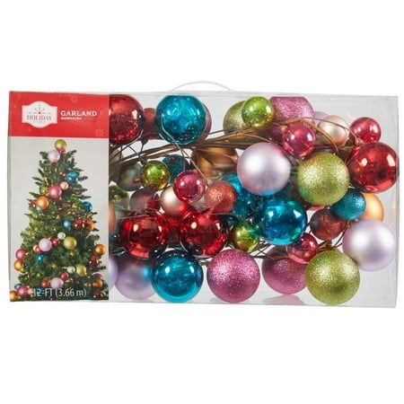 Add to your winter aesthetic this season with the Holiday Time Shatterproof Multicolor Ball Ornament Garland. This fully assembled garland features unbreakable ornaments in a variety of colors, sizes, and finishes. Use it to decorate your tree, hang it over your mantel, along your staircase, or on your door to greet your guests for the holidays. Celebrate the most wonderful time of the year by preparing your home for Christmas gatherings with our Holiday Time collection of products to help compl Christmas Tree Without Garland, Holiday Door Garland, Colorful Eclectic Christmas Decor, Big Impact Christmas Decorations, Colorful Kids Christmas Tree, Christmas Tree Balls Decoration, Christmas Decor Luxury, Colorful Christmas Garland, Vintage Christmas Tree Garland