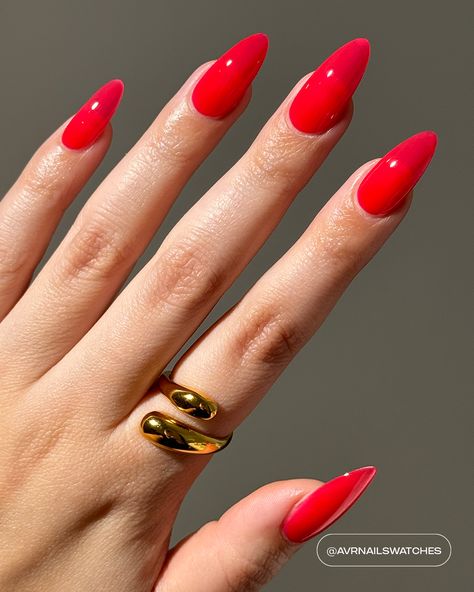 A coral red sheer polish with a jelly finish. Watermelon Red Nails, Red Jelly Nails Design, Sheer Red Nails, Coral Red Nails Summer, Red Coral Nails, Pinkish Red Nails, Candy Red Nails, Coral Red Nails, Red Oval Nails