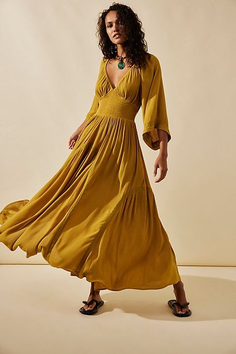 Romantic and ethereal, this sweet maxi from our free-est collection is a true versatile staple. **Fit:** Billowy throughout with cinched waist **Features:** V-neckline, smocked paneling at bodice, exaggerated sleeves, embroidered lace piecing at the skirt **Why We ❤ It:** Timeless with a sleek heel or laid back with simple flats, this style has endless ways to wear. | Dixie Maxi Dress by free-est at Free People in Yellow, Size: XS Simple Flats, Mesh Floral Dress, Long Sleeve Peasant Dress, Brown Maxi Dresses, Spell Dresses, Dresses Romantic, Ribbed Maxi Dress, Exaggerated Sleeves, Free People Maxi Dress