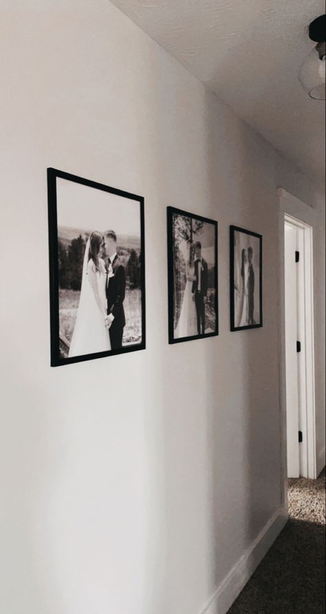 Black And White Photo Wall Hallway, Living Room Family Portrait Wall Ideas, Hanging Wedding Pictures In House, Wedding Photos Over Bed, Living Room Wedding Photo Display, Wedding Photo Display Home Living Room, Couple Photo Wall, Wedding Pictures Display At Home, Wedding Photo Gallery Wall