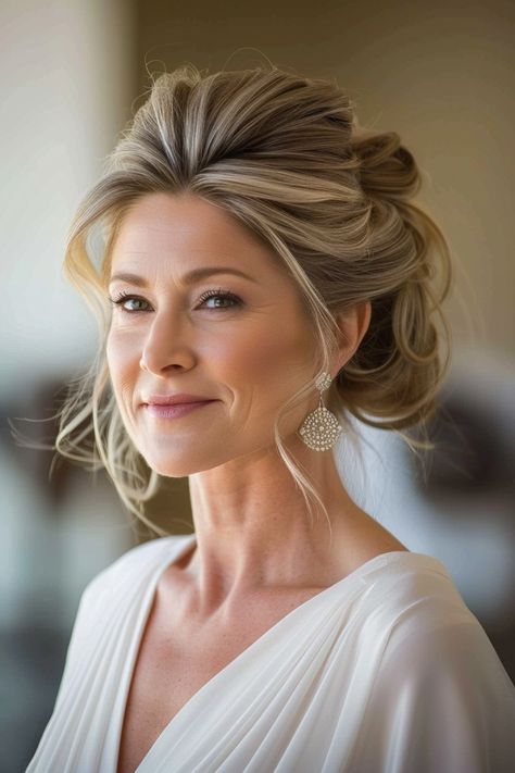 mother-of-the-groom-hairstyles Hair Mother Of The Bride Hairstyles, Messy Bun Mother Of The Bride, Half Up Mob Hair, Makeup Wedding Mother Of The Bride, Mother Updos For Wedding, Mom Of Groom Hair, Other Of The Bride Hairstyles, Silver Hair Updo Wedding, Mother Of The Groom Makeup Ideas