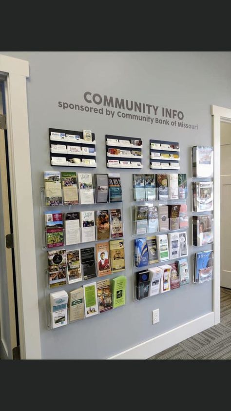 Office Pamphlet Display, How To Display Business Licenses, Community Office Space Ideas, Small Lobby Ideas, Brochure Display Wall, Business Lobby Ideas, Community Office Space, Resource Wall Ideas, Non Profit Office Design