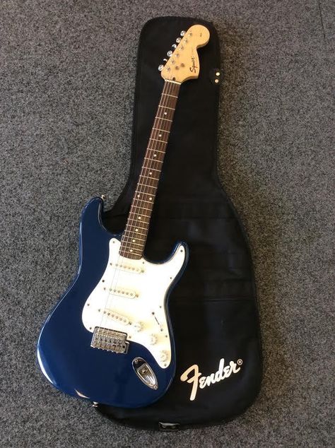 Fender Squier Strat Affinity Series Electric Guitar Dark Blue. My second guitar.💙 Navy Blue Electric Guitar, Pretty Guitars Electric, Electric Guitar Guy, Guitar Motivation, Guitar Dark, Strat Guitar, Guitar Aesthetic, Blue Electric Guitar, Electric Guitar Design