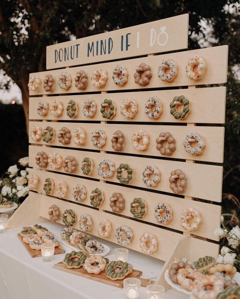 Donut Stack Wedding, Donut Bar At Wedding, Donut Wall Wedding Dessert Tables, Donut Desert Wedding, Donut Displays For Weddings, Donut Mind If I Do Donut Wall, Diy Donut Wall Wedding, Bridal Shower Donuts Ideas, Donuts Wedding Display