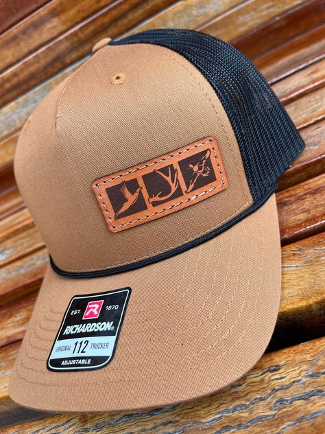 These leather patch Richardson 112FPR Rope hats are a great way to flaunt your style and look sleek at the same time. Patches made from 100% leather and engraved with a crisp design and hand stitched on our most popular style of hat. Your friends are going to be jealous! Multiple hat colors available, Bulk pricing available (see below) custom shape patches available upon request. SIZE OF PATCH HEIGHT WILL VARY DEPENDING ON CUSTOMER LOGO If a hat color is not listed please message us and we can o Hunting Hats, Hat Patches Design, Leather Patches On Hats, Leather Patch Ideas, Leather Hat Patch Ideas, Leather Patch Hat Ideas, Leather Patch Hats, Leather Hat Patch, Hat Patch Ideas