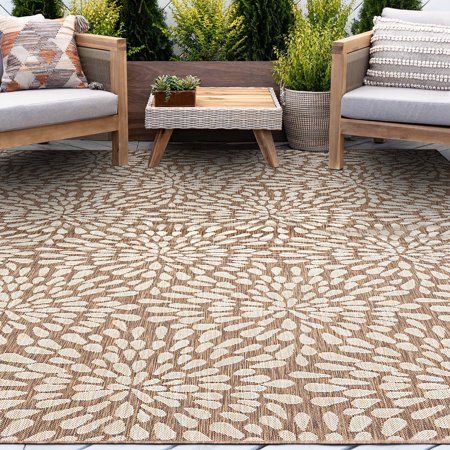 Make your indoor or outdoor living space sparkle like fireworks with this transitional floral pattern area rug. This fun design will bring joy to your family gatherings. Treated fibers resist staining and fading, this rug is built to perform. Perfect for a family room, sunroom, porch, deck, den, living room, playroom, nursery. May be cleaned outside with mild detergent and garden hose, allow to dry thoroughly. Transitional 5x8 Area Rug (5'3'' x 7'3'') Floral Brown, Cream Indoor Outdoor Rectangle Front Door Entry, Outside Area, Cream Living Rooms, Porch Balcony, Deck Porch, 5x8 Area Rugs, Outdoor Rugs Patio, Door Entry, 4x6 Area Rugs