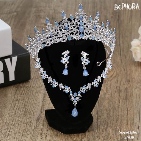 Material:Rhinestone, Crystal 👑Surface length of 14.5 cm and a crown height of 6.8 cm - Necklace 45 CM Black Friday & Christmas, End of the year Final sale 🎁  (Limited Stock!) 🍓PROMO 1: Buy ANY Headpiece get a $22 Nail set For FREE  🍓PROMO 2: Buy total over $99 GET a $50 Crown For FREE  🎊 (Random Surprise Present Pack - Handpicked Mystery Items, Ideal for Gift-Giving, Delightful Surprise with Every Order) 👑Luxury bridal Crown encrusted with crystals, this royal wedding headpiece is perfect for your special day 👑A dramatic headpiece with timeless quality. Design to sit on top of the head. Not arround to wear like a hat. Luxury crystal decoration makes a regal look. 🎁🍓Best gift on Black Friday, Cyber Monday & Christmas,new year, birthday, anniversary  🎁🍓Perfect for Halloween, Homec Quinceanera Gifts, Quinceanera Tiaras, Blue Opal Jewelry, Opal Jewelry Set, Light Blue Wedding, Crown Necklace, Black Friday Christmas, Luxury Bridal, Bridal Crown