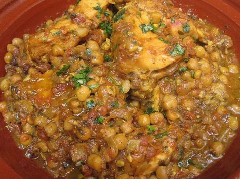 Moroccan Tagine of Chicken with Chickpeas and Raisins Morracan Chicken, Ras El Hanout Recipe, Vegetarian Tagine, Chicken With Chickpeas, Moroccan Chicken Tagine, Moroccan Chicken Recipe, Moroccan Tagine, Chicken Chickpea, Apricot Recipes