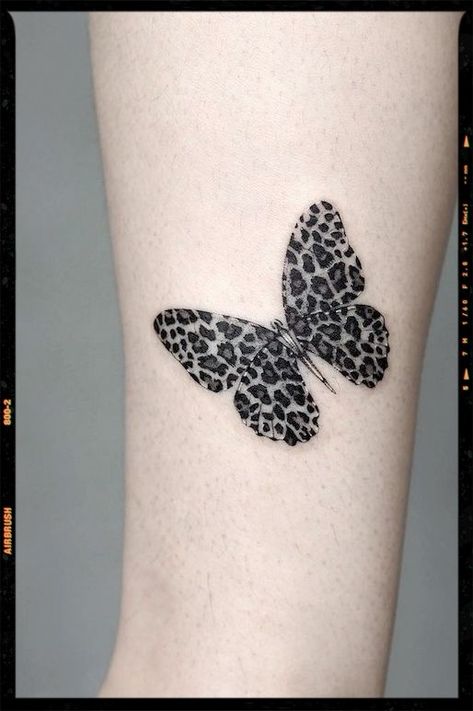 Leopard Butterfly Leg Tattoo Animal Print Butterfly Tattoo, Leopard Print Tattoo For Women Arm, Leopard Feather Tattoo, Leopard Outline Tattoo, Cheetah Print Butterfly Tattoo, Leg Filler Tattoo Ideas Women, Butterfly Leopard Tattoo, Leopard Print Hand Tattoo, Leopard Print Butterfly Tattoo