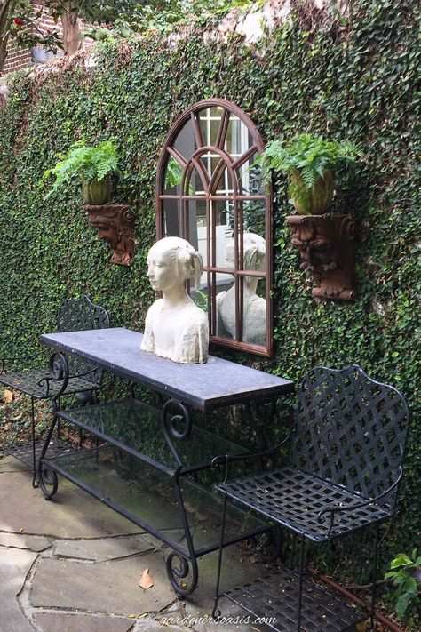 Secret garden decorations including an outdoor mirror, console table, statue and wall sconces Mirrors In The Garden, Secret Garden Room, Outdoor Mirrors, Secret Garden Ideas, Charleston Gardens, Garden Escape, Tattoo Plant, Outdoor Console Table, Backyard Shade