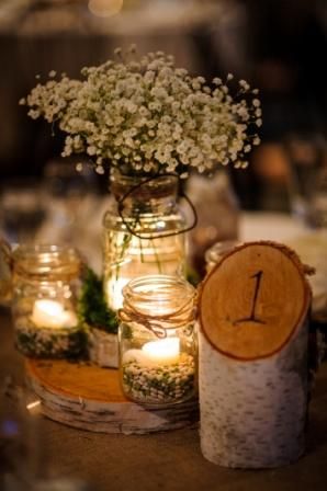 Birch tree table numbers, mason jars with pebbles and tea light candles at The Whispering Pines Conference Center #wpinescc #altonjonescampus  #uri Country Thanksgiving Decorations, Birch Centerpieces, Tree Wedding Centerpieces, Birch Tree Decor, Wedding Tree Decorations, Birch Tree Wedding, Wedding Centerpieces Mason Jars, Birch Wedding, Romantic Rustic Wedding