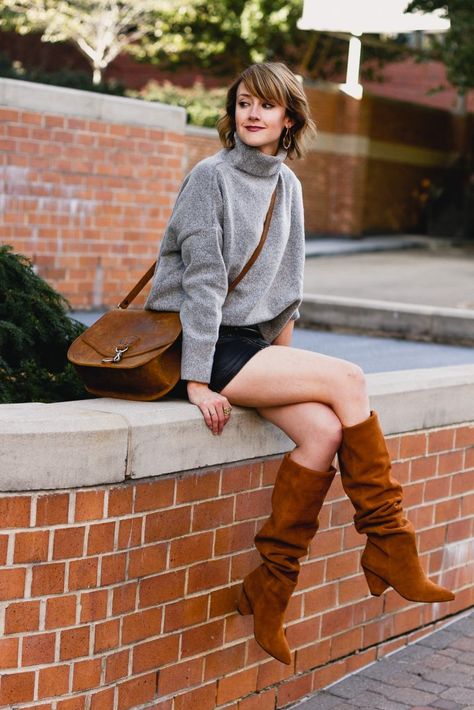 oversized sweater, leather skirt, and slouchy brown boots Long Brown Boots Outfits, Slouch Boots Outfit, Slouchy Boots Outfit, Tall Brown Boots Outfit, Sweater Leather Skirt, Leggings Work Outfit, Brown Slouchy Boots, Suede Boots Outfit, Long Brown Boots