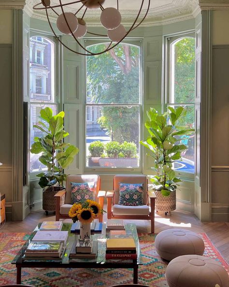 Browse Photos | Apartment Therapy Bay Window Plants, Green Couch Living Room, Bay Window Living Room, Sf Apartment, Bedroom Design Trends, Mid Century Modern Aesthetic, Window Plants, Green Couch, Cosy Living Room