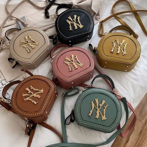 Fashion Bomb Daily on Instagram: “With gold filigree detail and studs, these mini bags by @gold4lyfe are named The New Yorker and available in a range of colors for a steal…” Yankee Hat, Round Purse, Beige Handbags, Bucket Handbags, Brown Crossbody Bag, Minimalist Bag, Cross Body Bags, Brown Crossbody, Brown Leather Bag