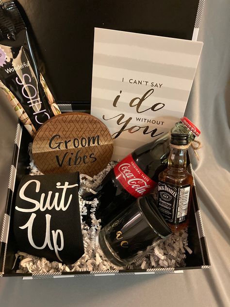 "The Groomsmen Box _ Suit up and Save the Date, Will you be my Groomsman for the Day? This Box has everything you need to ask your Crew individually to be apart of your Big day. Everything you need is in this Box  Box Includes:  \"I can't say I do without you\" card            Groom Vibes Wooden coaster     Coca Cola bottle   Personalized shot glass   \"Suit Up\" Tie  1.25 oz. pistachio  *libation is not included" Junior Groomsman Gift, Asking Groomsmen, Groom Box, Groomsmen Boxes, Groomsman Proposal Box, Bridesmaid Proposal Diy, Groomsmen Party, Groomsmen Proposal Gifts, Bridesmaid Groomsmen Gifts