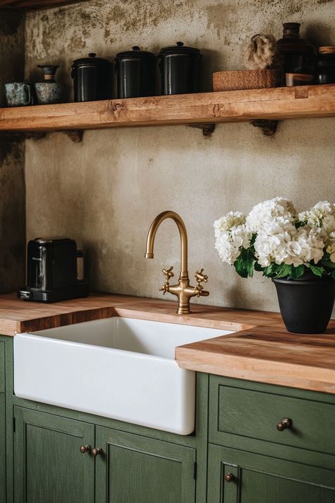 Discover the latest kitchen design featuring rustic wooden countertops, elegant brass fixtures, and open shelving. This beautiful setup combines functionality with classic aesthetics. Perfect for those seeking a cozy and stylish kitchen update. 🌿🏡 #KitchenDesign #HomeDecor #RusticCharm Kitchen Wooden Countertops, Rustic Wood Countertops, Wooden Kitchen Countertops, 60s Ranch, Rustic Kitchen Countertops, Wooden Countertops Kitchen, Classic English Kitchen, Earthy Kitchen, Timeless Kitchen Design