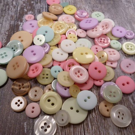 We have a range of buttons dyed especailly for us - they match with 45 of our felt colours. These button mixes are made with those specially dyed buttons Each bag contains 50g of buttons.  The photos show 50g but each bag will vary because we sell these by weight Buttons Aesthetic, Cute Buttons, Felt Succulents, Cool Buttons, Tree Garland, Felt Halloween, Christmas Decorations Ornaments, Button Crafts, Felt Fabric