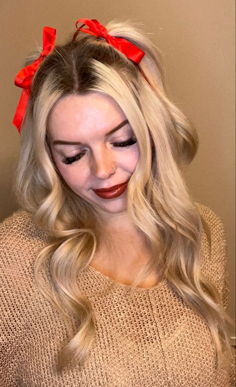 Woman with ribbons in hair Christmas Hair And Makeup, Christmas Photos Hairstyles, Cute Christmas Party Hairstyles, Crismas Hairstyles, Christmas Hair For Women, Christmas Hair With Ribbon, Cute Hair Bow Hairstyles, Christmas Hair Updo, Christmas Pictures Hairstyles