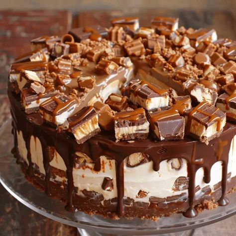 Snickers Cheesecake No Bake Snickers Cheesecake, Snickers Cheesecake Recipe, Caramel Cakes, Lush Desserts, Snickers Cake, Snickers Cheesecake, Sweets Ideas, Cinnamon Roll Recipe Homemade, Cake Slicer