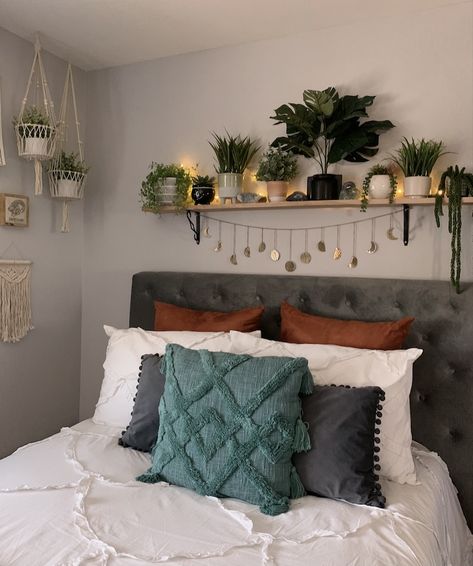 Above Tv Boho Decor, Floating Shelf With Plants Above Bed, Bedroom Ledge Decorating Ideas, Bedroom Above Headboard Decor, Plants Over Headboard, Shelf With Plants Above Bed, Boho Bedroom Shelf Above Bed, Shelves With Plants In Bedroom, Greenery Behind Bed