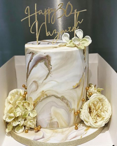 Sweet Tooth Bakery🍰🎂 on Instagram: “Beautiful cream & gold marbled 30th birthday cake with matching flowers & topper from @khadijascakes #goldcake #marbledcake #goldleaf…” Beige And Gold Birthday Cake, Gold And White Cake Birthday, Gold And Cream Birthday Cake, 56th Birthday Cake, White And Gold 30th Birthday Cake, Gold And White 50th Birthday Cake, White And Gold Cake Ideas, Gold And White Birthday Cake, Beige Birthday Cake