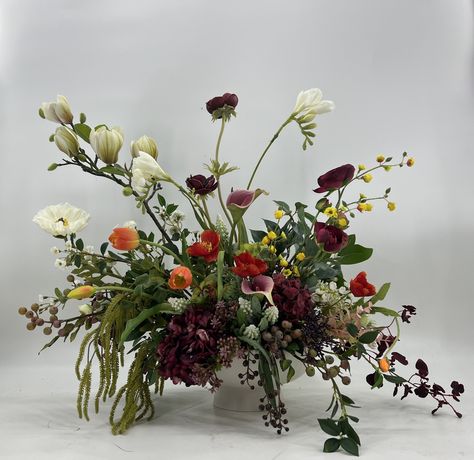 This is a beautiful year round centerpiece, made with top quality flowers made on a high quality ceramic compote bowlI used Anemones, callas, freesias, tulips, queen ann’s lace, hydrangeas, branches,and lots of different greenery.Approximately 25” tall and 27” wideThis will make a beautiful c Potted Flowers At Wedding, Tuscan Flower Arrangements, Low Flower Arrangements For Table, Plant Arrangements, Easter Arrangement, Winter Arrangements, Winter Centerpieces, Spring Arrangements, Corporate Flowers