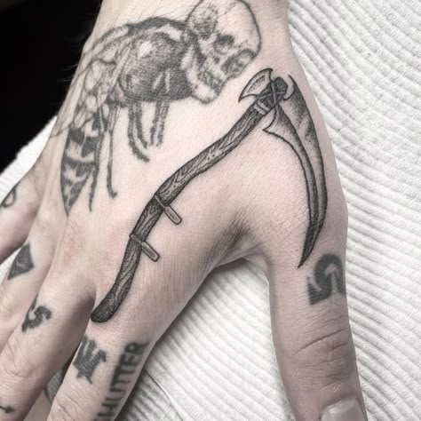 Hand Thumb Tattoo, Hand Tattoo Thumb, Scythe Hand Tattoo, Scythe Design Tattoo, Thumb Hand Tattoo, Grim Reaper Scythe Tattoo, Sythe Designs, Small Scythe Tattoo, Scythe And Rose Tattoo