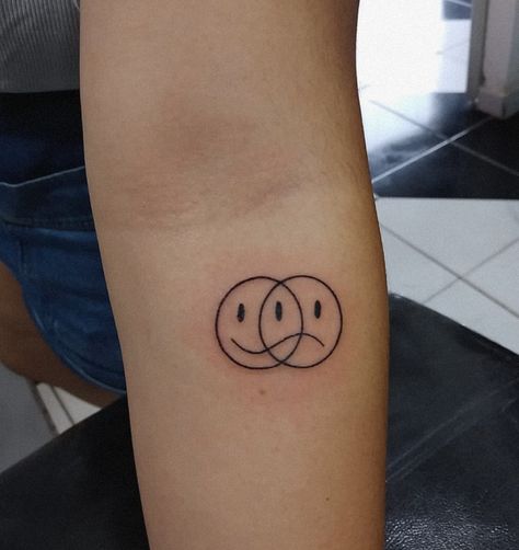 Fine Line Tattoo Smiley Face, Smiley Tattoo Ideas, Emotion Tattoo Ideas, Two Face Tattoo Men, Good Vibe Tattoos, Smiley Frowny Face Tattoo, Tattoo Designs Men Small Simple, Emoji Tattoos For Men, Spot Tattoo Sleeve