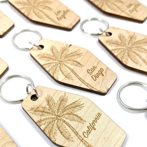 These customizable palm tree keychains have been my hottest item lately. It's the perfect touch for those with a vacation home, rental property, or even a backyard pool shed. 🌴 Order with any word or phrase you want, and I'll send you a proof to approve your design before it gets sent out. Palmas, Pet Paw Print Ornament, Tree Keychain, City Neighborhood, Paw Print Ornament, Palm Tree Design, Convention Gifts, Pet Paw Print, Laser Engraved Ideas