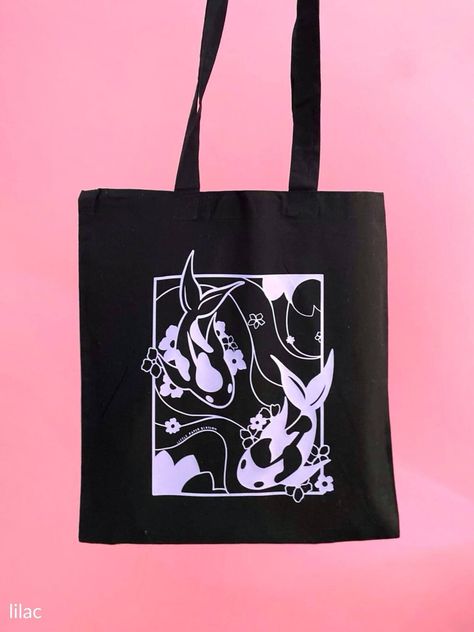 [CommissionsEarned] Koi Fish Are A Symbol Of Good Luck, Courage, And Perseverance In Southeast Asian Culture. A Perfect Token For You! Take This Gorgeous And Calming Koi Pond Design Everywhere You Go With Our Sturdy 100% Cotton Tote Bags. Information: Material: 100% Cotton Thickness: 150Gsm (Thick And Sturdy) Dimensions Of Bag: 23 23 Cm Dimensions Of Handles: 23 X 2.5Cm The Art Is Printed On Durable, High-Quality Vinyl. Colour Of Tote Bags: Black We Also Offer #cooltotebagdesign Black Canvas Bag Painting Ideas, Black Tote Bag Painting Ideas, Creative Tote Bag Design Ideas, Black Tote Bag Design Ideas, Black Tote Bag Design, Black Tote Bag Aesthetic, Design For Tote Bag, Cool Tote Bag Design, Bag Painting Ideas