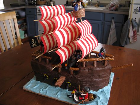 Yes! We eat it. The pirate ship cake is exciting to make, but devouring it is part of the process. Pirate Boat Cake, Ship Birthday Cake, Pirate Ship Cake, Pirate Birthday Cake, Birthday Cake Images, Pirate Ship Cakes, Ship Sails, Ship Cake, Boat Cake