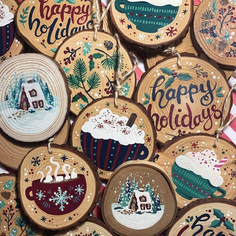 "Spruce up your Christmas tree this holiday season with these natural wood slice ornaments featuring exclusive artworks! Each piece was hand-painted for an individual, unique finish. Treat yourself and add to your own holiday decor collection or wrap them up as perfect gifts for family and friends! Product Description: Each wood slice is: fitted with a twine string loop perfect for hanging hand-painted with acrylic paint and sealed with a matte varnish. -Pieces vary in size from 3.5\" to 4.5\" i Wood Tree Ornaments Diy, Wood Piece Ornaments Diy, Christmas Decor With Natural Materials, Christmas Hand Painted Ornaments, Circle Ornament Design, Wooden Christmas Ornament Painting Ideas, Wood Christmas Tree Ornaments, Wood Round Ornament Ideas, Natural Wood Ornaments