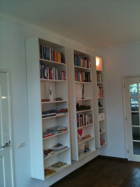 Ikea Billy bookcases mounted to the wall... I would love to do this with the glass doors for my dining room for china and glassware! Cheap Bookcase, Ikea Lack Shelves, Billy Ikea, Diy Space Saving, Billy Bookcase Hack, Ikea Billy Bookcase Hack, Ikea Bookcase, Floating Bookshelves, Wall Mounted Bookshelves