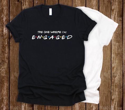 Newly engaged and a Friends fan?? You need this shirt to rock out during your engagement! Notice the fine detail in between, those are diamonds in between instead of circles too! TANK TOP AVAILABLE: https://www.etsy.com/listing/692037281/the-one-where-im-engaged-tank-top-bride?ref=listings_manager_grid  DETAILS & SIZING DETAILS: Shirts used are Bella Canvas brand. They are a very soft and high quality t-shirt. They have a more attractive fit than a regular gildan or fruit of a loom tshirt.  SIZI Finally Engaged, Engagement Shirt, Friends Fan, Cute Couple Shirts, Plus Wedding Dresses, Couples Shirts, Wedding Shirt, Friends Cake, Cute Engagement Photos