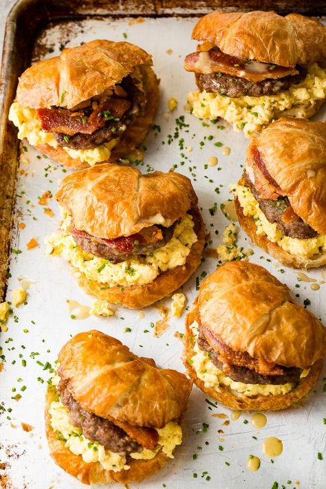 Maybe I shouldn't call these, Killer Maple Mustard Croissant Breakfast Sandwiches. I mean, they aren't healthy, but they are the best breakfast sandwich ever. With bacon AND sausage and loads of cheese and eggs, we've got all your savory breakfast bases covered! #bacon #breakfast #breakfastsandwich #croissant #eggs #maple #mustardsauce #sausage #savorybreakfast #recipe #breakfastrecipe #breakfastofchampions Croissant Breakfast Sandwiches, Bacon And Sausage, Croissant Breakfast Sandwich, Best Breakfast Sandwich, Oh Sweet Basil, Croissant Breakfast, Maple Mustard, Bacon Breakfast, The Best Breakfast