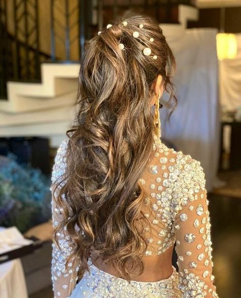 20+ Pearl-Adorned Bridal Hairstyles That You'll Love Medium Length Hairstyle For Bride, Sangeet Hairstyles For Bride On Gown, Braided Ponytail Hairstyles For Wedding, Hairstyle With Gowns, Hairstyles For Long Hair On Gown, Sangeet Hair Styles, Messy Ponytail Hairstyles Indian Wedding, Pony Tailed Hairstyle Wedding Indian, Saree Braid Hairstyles