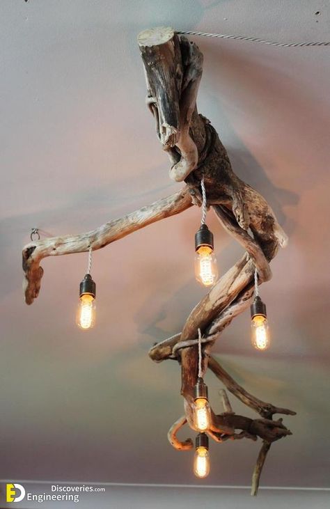 26+ Bewitching Natural Home Decor Ideas - Engineering Discoveries Drift Wood Lights, Chandeliers For Bedrooms, Art With Branches, Driftwood Light Fixture, Lampu Siling, Natural Chandelier, Pink House Interior, Wood Chandeliers, Natural Chandeliers