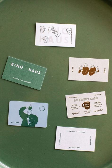 A creative business card design by Meiwen for Bing Haus, an ice cream shop that also serves coffee and tea. Inspired by old-school Korea, the clean sans serif logotype, retro monoline illustrations and an earthy colour palette, all elements can be seen on various card designs: business card, discount card, gift card and loyalty card. #businesscards #branding #identity #graphicdesign #brandinspiration #branddesign #namecards #typography #wordmark #businesscard #businesscarddesign School Business Card Design, Coffee Shop Loyalty Card Design, Loyalty Card Design Creative, Coffee Card Design, Coffee Loyalty Card Design, Discount Card Design Ideas, Business Gift Card Design, Business Card Illustration, Coffee Business Card