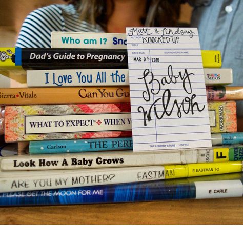 Cute Library Themed Pregnancy Announcement #pregnancyannouncement Book Themed Pregnancy Announcement, Bookish Pregnancy Announcement, Bookish Baby Announcement, Book Baby Announcement, Book Pregnancy Announcement, Pregnancy Announcement September, Harry Potter Pregnancy Announcement, Literary Nursery, Nerdy Nursery