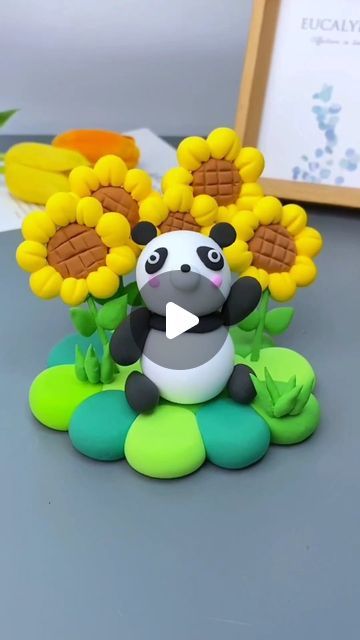 Paper Craft Ideas on Instagram: "Clay link in our Bio.
Watch as we create an adorable clay panda step-by-step! 🐼✨ In this video, we'll guide you through the entire process, from shaping the panda’s body to adding its charming features. Perfect for a fun crafting session, this tutorial is easy to follow and ideal for both kids and adults. Start by flattening the brown air dry clay for the base. Add yellow leaves around it and a green stem below. Shape flat black circles between white balls for the eyes, then add legs and other body parts. Join us and bring your own cute clay panda to life!" Fimo, Clay Panda, Clay Art For Kids, Art Videos Tutorials, Cute Clay, Ceramics Pottery, Yellow Leaves, Polymer Clay Creations, Clay Tutorials