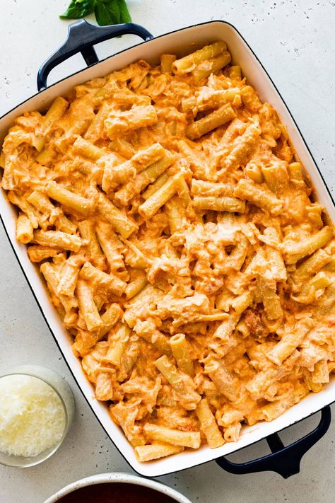 Easy Meatless Baked Ziti Recipe with Ricotta Cheese- Three kinds of cheese layered with pasta and homemade tomato sauce baked to golden brown Baked Fusilli Pasta Recipes, Baked Ziti Recipe Meatless, Bake Ziti Recipe With Ricotta, Baked Ziti Recipe With Ricotta, Noodles With Ricotta Cheese, Meatless Baked Ziti With Ricotta, Meals With Ricotta Cheese, Baked Ziti Ricotta Cheese, Pasta Bake With Ricotta Cheese