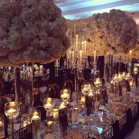 Looking back at the gorgeous Masquerade Gala decor from the @coterieretreat last December. This year we're heading to Johannesburg South Africa and can not wait to begin the party planning! #Munaluchi #munaluchibride #coterieretreat17 #weddingdecor #luxuryweddings / #Repost @weddingsbylulu  Honestly this iPhone shot doesn't do justice to the absolutely breathtaking scene at the @munaluchibride #coterieretreat16 masquerade ball designed by our supremely talented friend @ellybevents with her amazi Masquerade Gala, Candelabra Centerpieces, Gala Decor, Masquerade Prom, Gala Decorations, Masquerade Theme, Masquerade Wedding, Gala Ideas, Venetian Masquerade