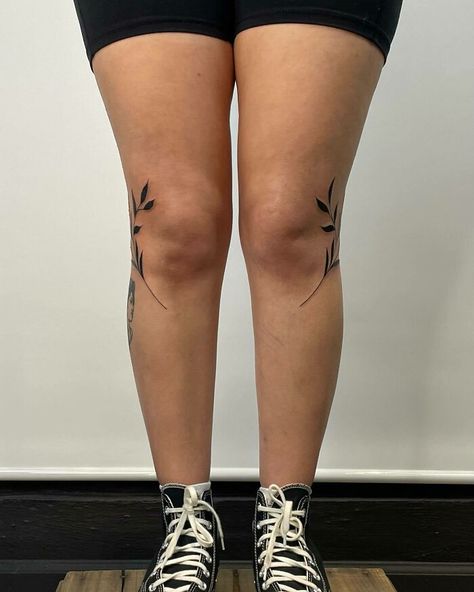 Leaves beside both knees tattoos Knee Laurel Tattoo, Word Above Knee Tattoo, Knee Leaves Tattoo, Inside Knee Tattoo, Knee Leaf Tattoo, Knee Tattoo Placement, Leaf Knee Tattoo, Wrap Around Knee Tattoo, Lower Knee Tattoo