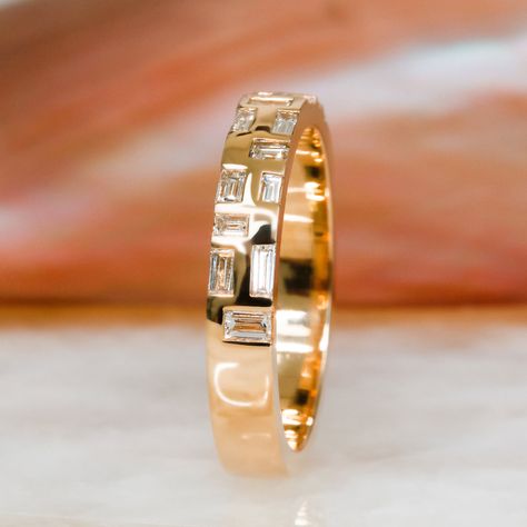 This unique diamond wedding band showcases 0.55 carats of striking Baguette Cut natural diamonds in a 14k Yellow delicate setting. With its bold and modern look, this band is perfect for someone who wants a wedding band that is anything but traditional. Diana Rafael specializes in customizing this band to your engagement ring. Thick Wedding Bands For Women, Wide Wedding Bands For Women, Flat Engagement Ring, Stackable Engagement Rings, Flat Engagement Rings, Thick Band Engagement Ring, Vintage Inspired Wedding Band, Bezel Set Wedding Band, 2026 Wedding