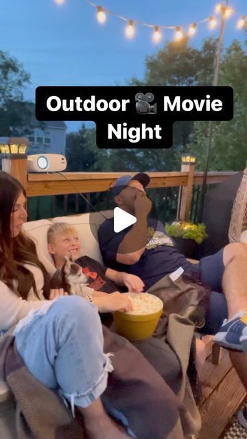 Amanda Albrecht Illinois Realtor + Content Creator on Instagram: "Outdoor Movie 🎥 Night! This was so fun for the whole family and easy to set up. 

I used no hole vinyl hooks to easily attach the cloth screen to the back of the home. 

Next we set up our mini projector which was under $80 and only needed an extension cord and your phone to operate.

Can’t forget the candy and popcorn 🍿 

Save for later and follow @sellingthesuburbs for more! 
.
.
.
#home #family #movienight #outdoormovie #outdoormovienight #familymovienight #familyactivities #kidapproved #datenight #howto #outdoorspaces #realtor #realestate #momsofinstagram #momstyle #napervillemoms #momsofboys #momsofplainfield #bestofplainfield #sellingthesuburbs #realtoring #realtormom #outdoorentertaining #diyoutdoors #homesweethome Projector And Screen, Movie Trailer Ideas, Outside Projector Ideas, Outdoor Movie Projector Set Up, Movie Night Ideas Outdoor, Outdoor Projector Ideas, Outdoor Movie Night Ideas, Outside Projector, Realtor Content