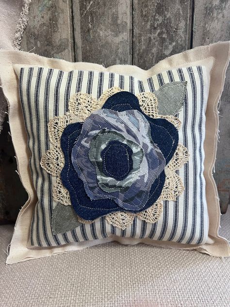 This pillow is ONE OF A KIND!  It has a neutral background, Vintage French Rose denim fabric, and a vintage doily. Layered for this cozy cottage /farmhouse look.   Each pillow is distressed to give it a worn look.  It has natural fraying and will fray more with time which will give it that beautiful country cottage look that is desired .Each pillow made is handsewn by me in my country cottage. Pillow measures around 10.5" X 10.5"  Sizes and some of its characteristics will very with each pillow Personalized Pillows Diy, French Country Pillows, Prayer Pillow, Homemade Pillows, Cottage Pillows, Country Pillows, Denim Pillow, Vintage Doily, Handmade Farmhouse