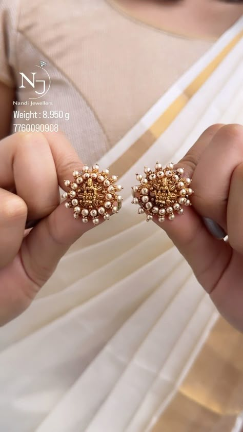 Lakshmi Pearl Ear Studs From 'Nandi Jewels' • South India Jewels Ear Studs Indian, Big Earrings Gold, Pearl Earrings Designs, New Gold Jewellery Designs, Gold Earrings Models, Diamond Pendants Designs, Gold Earrings Wedding, Hindu Goddess, Antique Bridal Jewelry