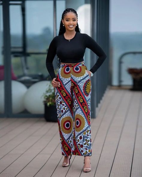 Ankara Styles 2022: Beautiful Trouser Outfit for Ladies. - Ladeey Trouser And Top For Ladies, Outfit For Ladies, Ankara Pants, Ankara Trousers, Ankara Styles For Women, Fashion Trousers, Short African Dresses, Bell Pants, Ankara Fashion